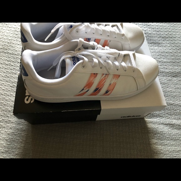 white adidas shoes with pink stripes